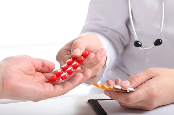 The doctor prescribes drugs for the treatment of cervical osteochondrosis